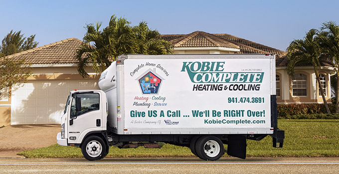 Service Vehicle from a licensed HVAC company parked outside home
